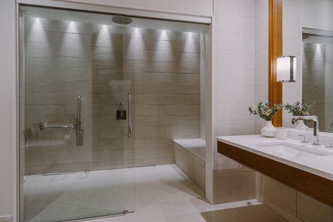 Our wheelchair accessible Deluxe rooms have a roll in shower