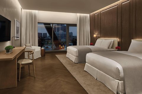 Suite Penthouse Royal - Dormitorio con dos camas tamaño Queen
